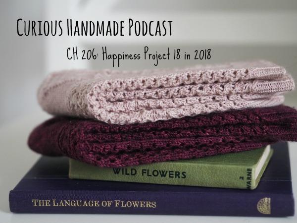 Two pairs of Winter Rose Handknit Socks by Curious Handmade with books about flowers