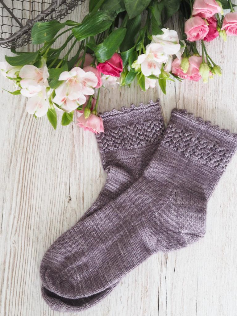 The Lavender Fields Socks in misty mauve, design by Helen Stewart, Curious Handmade