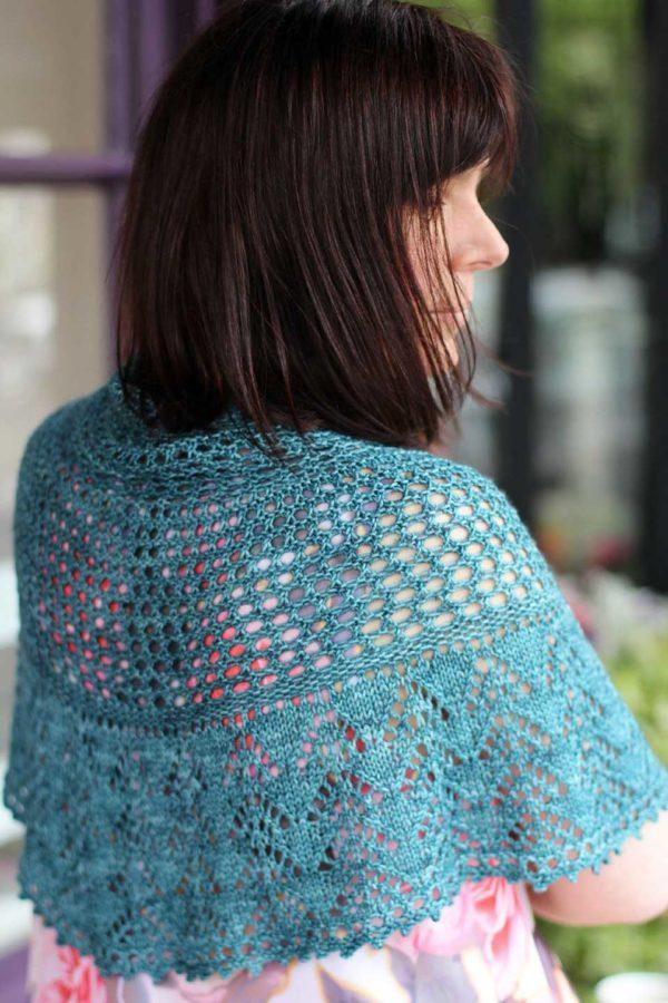 Fine lace-knitted shawl in blue, red and purple