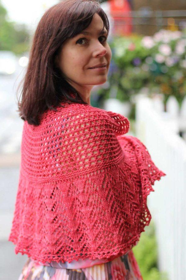 Fine lace-knitted shawl in red