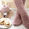Cornish Cream Tea Socks have a panel of lace and texture down the front of the leg and foot with plain stockinette at the back.
