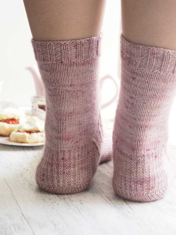 Cornish Cream Tea Socks have a panel of lace and texture down the front of the leg and foot with plain stockinette at the back.