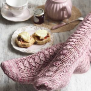 Cornish Cream Tea Socks have a panel of lace and texture down the front of the leg and foot with plain stockinette at the back.