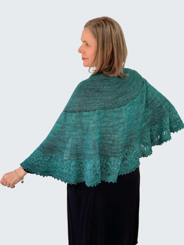 The Floating shawl is inspired by the ocean and a deep green