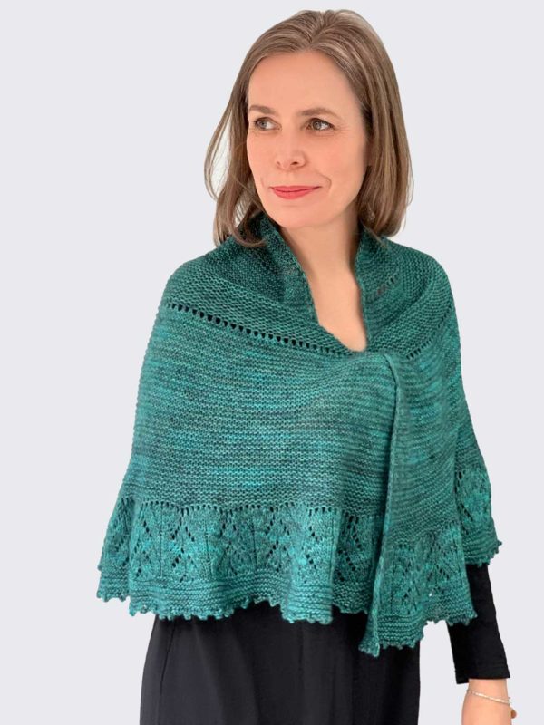 The Floating shawl is inspired by the ocean and a deep green