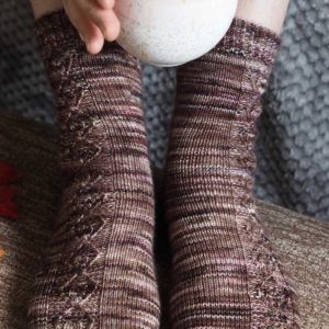 The Hazelnut Socks have a simple twisted stitches creates texture and interest.