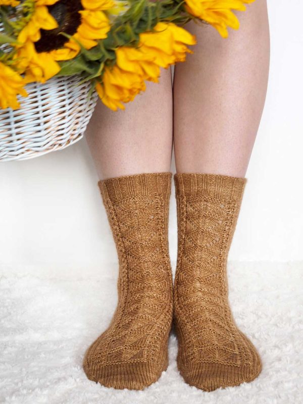 The Honey Bee Dance Socks feature panel at front and plain stockinette at back, they're an interesting knit with plenty of relaxed sections.