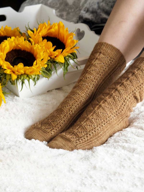 The Honey Bee Dance Socks feature panel at front and plain stockinette at back, they're an interesting knit with plenty of relaxed sections.