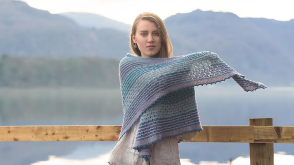 The Kelso Shawl pattern was designed to feature the distinct beauty of the yarn, bringing its complex saturated tones.