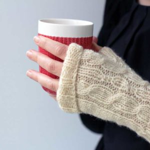 The Kindling Mitts are a beautiful cream, rustic yet classic, easy-to-knit fingerless gloves.