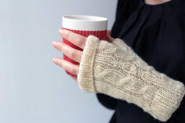 The Kindling Mitts are a beautiful cream, rustic yet classic, easy-to-knit fingerless gloves.