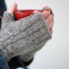 The Kindling Mitts are a beautiful grey, rustic yet classic, easy-to-knit fingerless gloves.