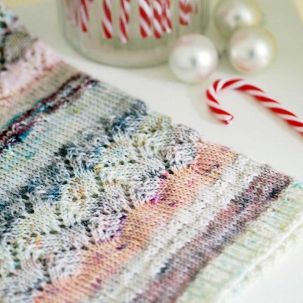 The Land of Sweets is a multi-coloured cowl inspired by their favourite sweets, candy and lollies
