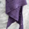 The Little Meg Shawl design is simple, eyelets dotted across a field of stockinette stitch
