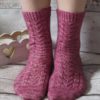 The Magnolia Socks are a plain red stockinette with a heel flap and gusset, and a round toe for a comfy fit.