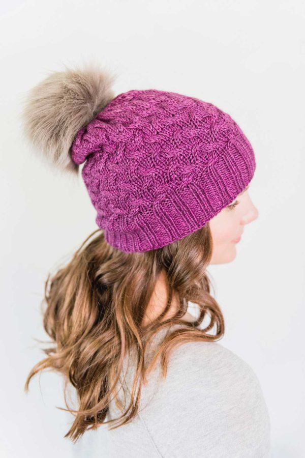 The Montage Hat pattern has deep ribbing and a slightly slouchy fit.