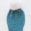 The Montage Hat pattern has deep ribbing and a slightly slouchy fit.