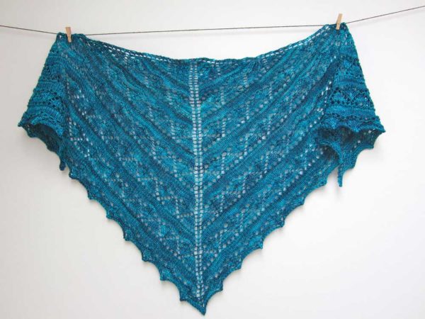 The Odessa Shawl is triangular construction knit is ideal for beginner lace knitters wishing to tackle their first lace shawl project.