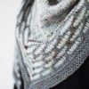 The Rockpooling Shawl is a traditional triangle shape with contemporary detailing, easy but evocative slip-stitch pattern, in three colours.