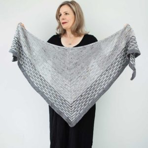 The Rockpooling Shawl is a traditional triangle shape with contemporary detailing, easy but evocative slip-stitch pattern, in three colours.