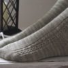 The Sailing School Socks feature a nautical side panel and a decorative stitches, and a heel flap and gusset with a wedge toe finish off.