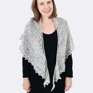 This two-skein Sea Gleam Shawl is a gentle crescent shape. It's big on texture, with broad garter, stockinette sections and a lace border.