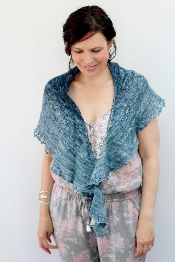 Magical, safe, and full of good fortune, the Talisman Shawl is a carefree crescent, inscribed with a simple star stitch.