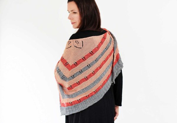 The Whole World is a Garden is delicate lace leaf detailed shawl in a triangle shape, knit from luxurious light fingering yarn.