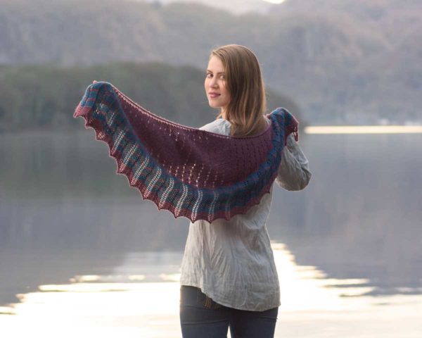 The stripes of the crescent-shaped Tobermory Shawl and easy lace and eyelets, hint at the promise of riches beneath the waves.