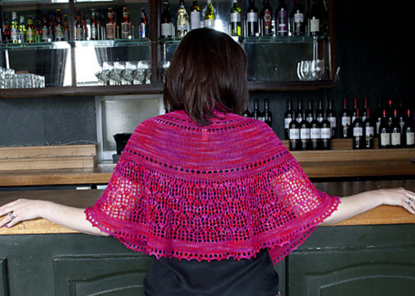 The Velvet Rose Shawl is a delicate yet seductive shawl in a semicircular shape, created using sock weight yarn.