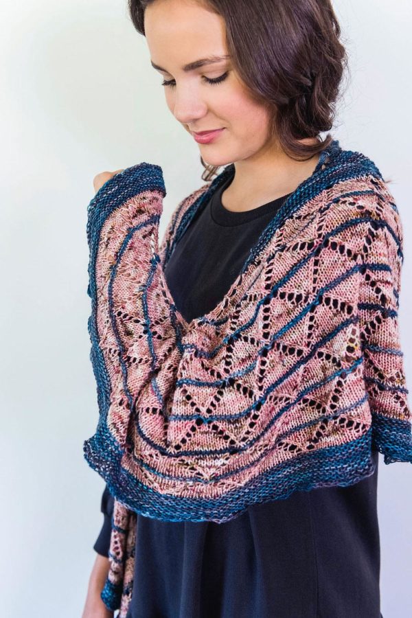 The Veranda Shade Shawl celebrates the luxurious laziness of summertime. This classic crescent shawl is ideal holiday knitting.