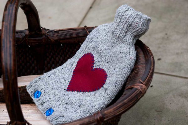 These fun hot water bottles Warm Wishes Hottie Cover can be knit up in an evening or two for the star, puppy, or love in your life.
