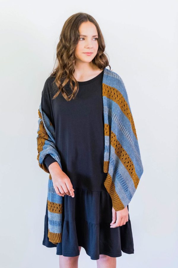 The Wild Bees Wrap is a three-colour rectangular wrap is a fun and engaging knit on a grand scale, with plenty of interest.