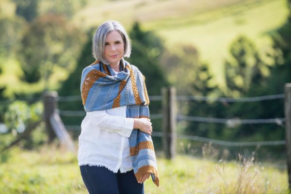 The Wild Bees Wrap is a three-colour rectangular wrap is a fun and engaging knit on a grand scale, with plenty of interest.