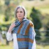 The Wild Bees Wrap is a three-colour rectangular wrap is a fun and engaging knit on a grand scale, with plenty of interest.