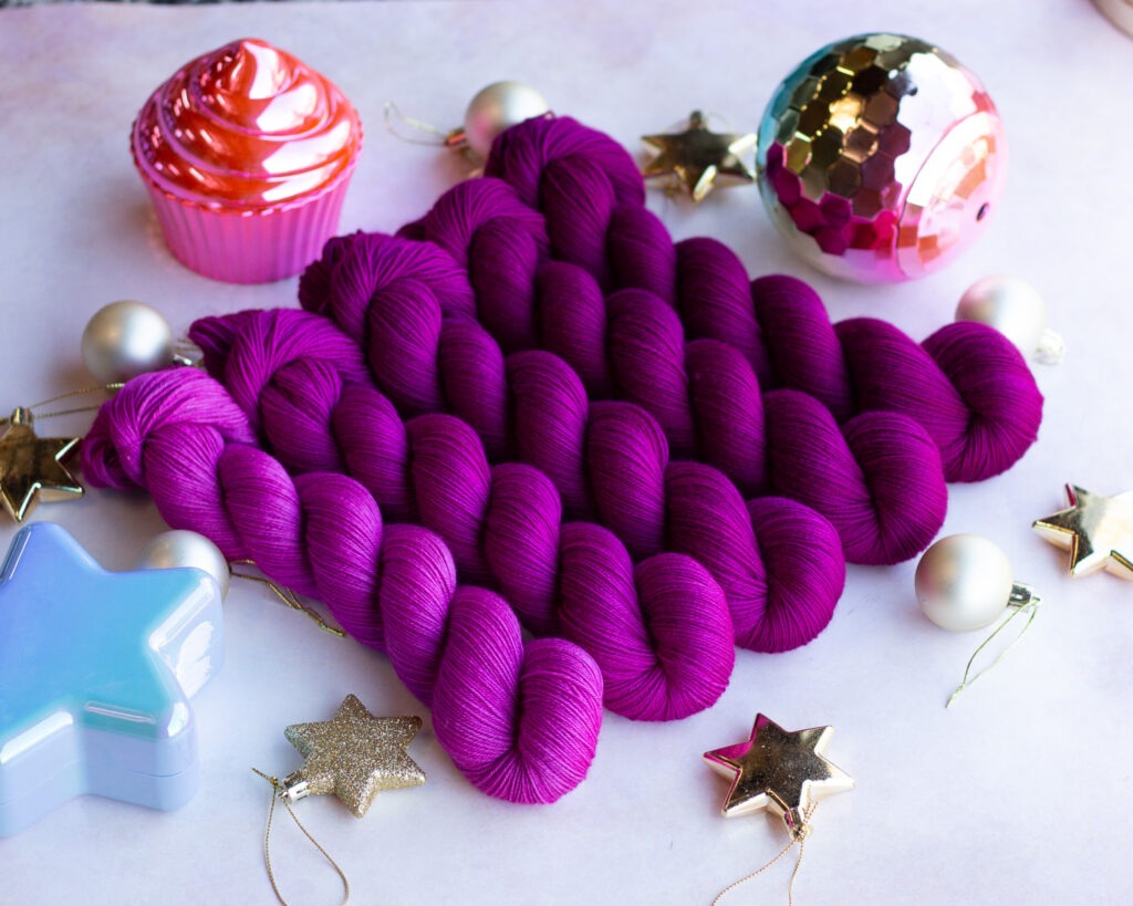 A five skein fade set of hand dyed yarn by Louie & Lola